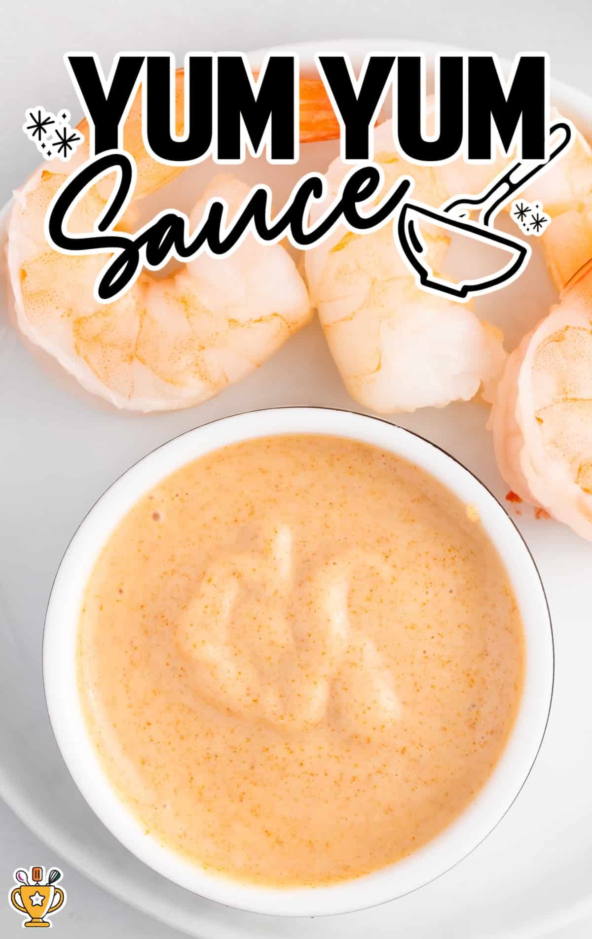 overhead shot of Yum Yum Sauce in a cup with shrimp