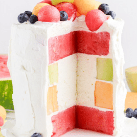 watermelon cake with a piece served from it