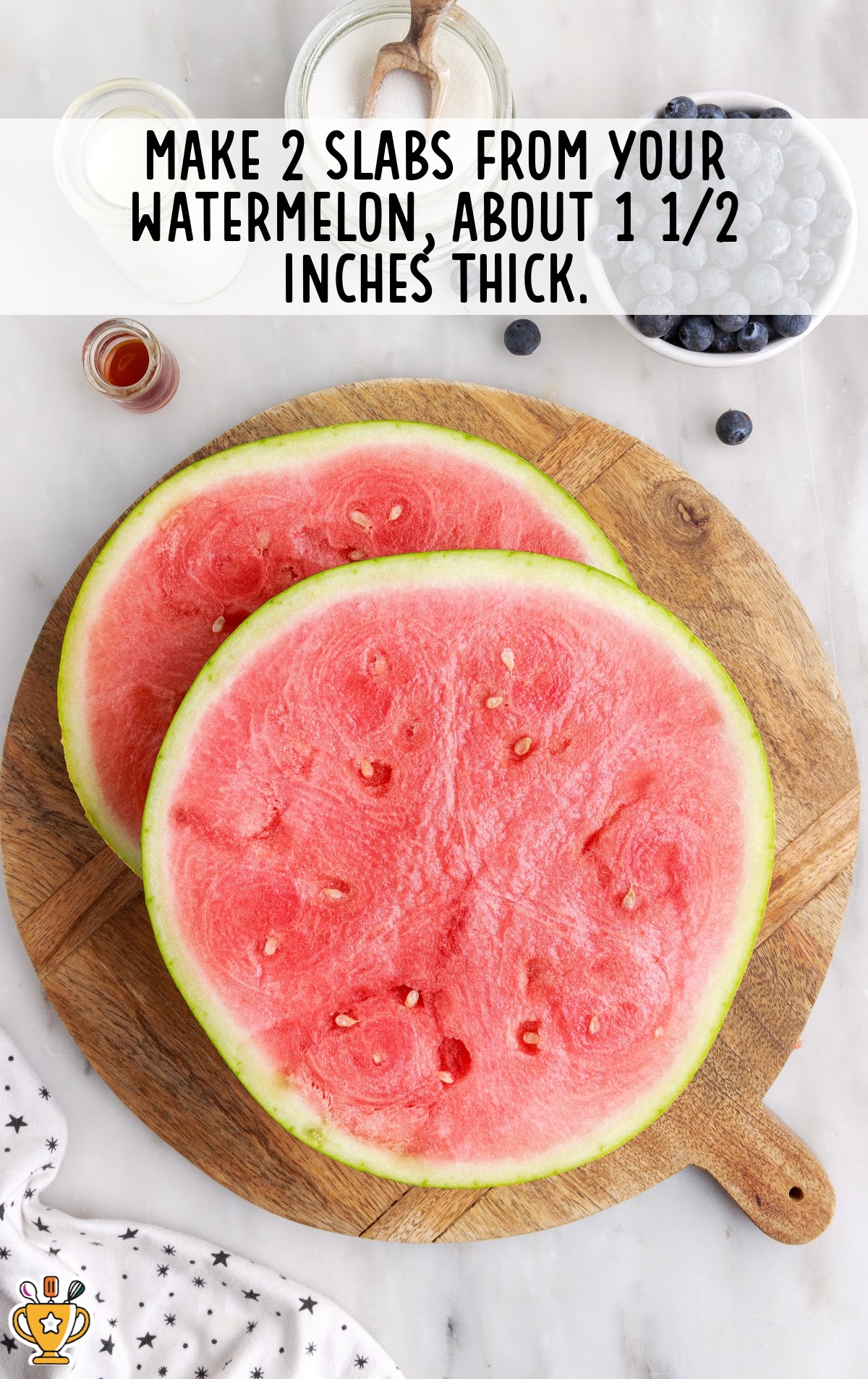 2 slabs of watermelon on a cutting board