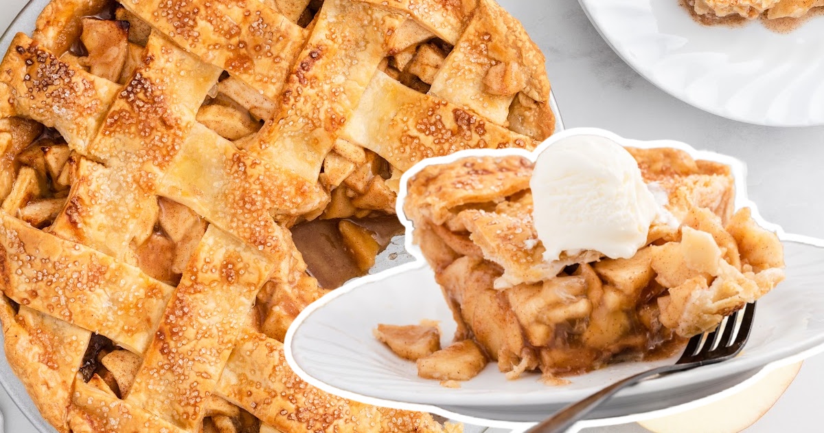 A piece of Apple pie on a plate with a fork