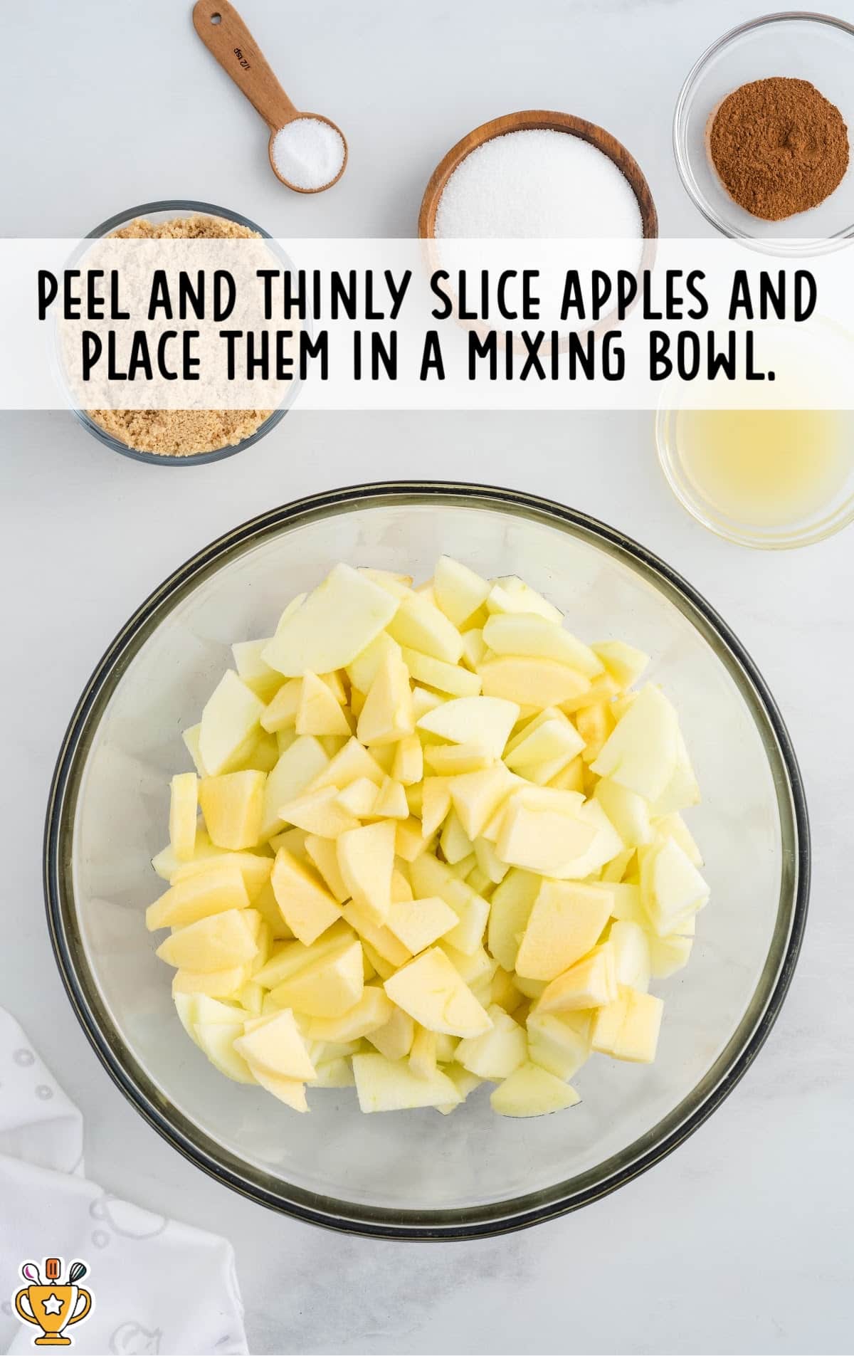 Apple slices in a mixing bowl