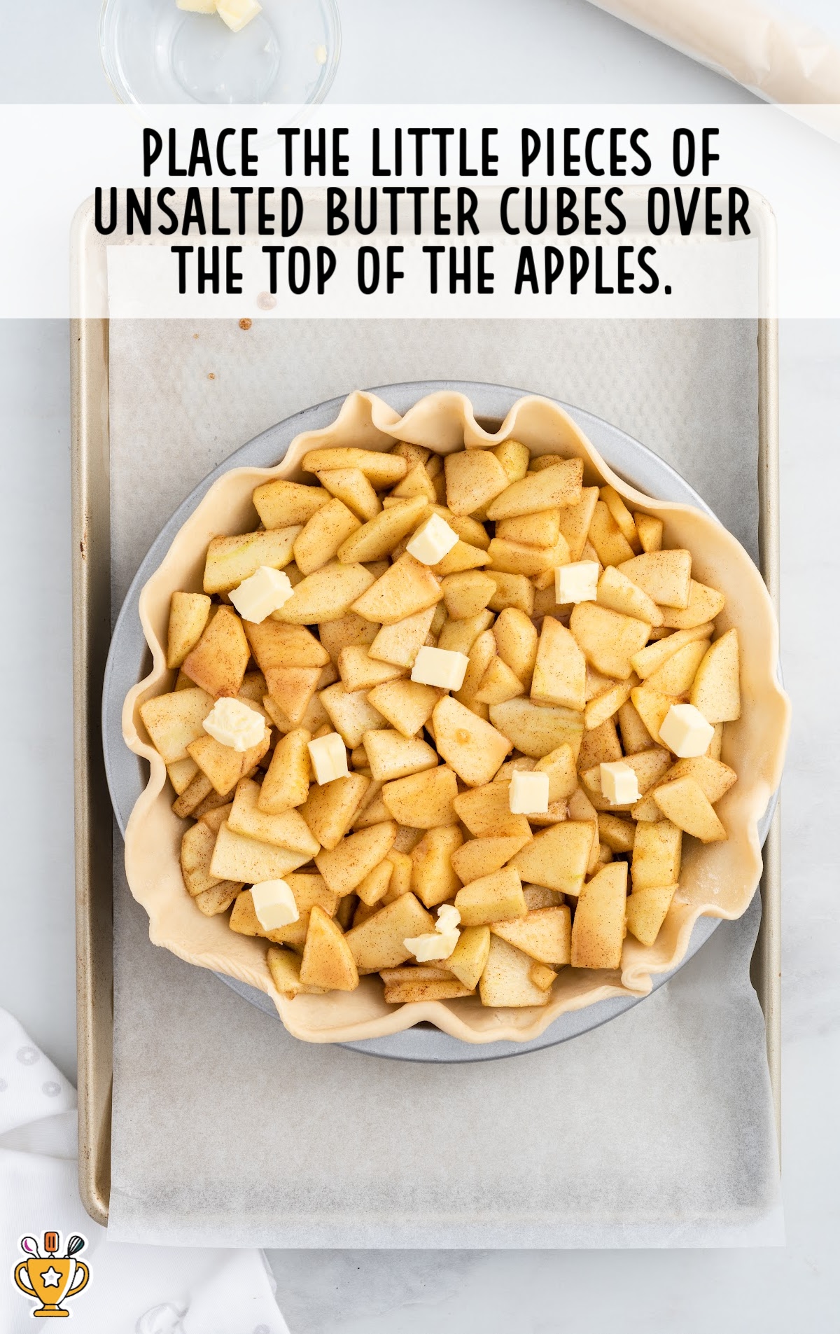 Butter Cubes placed over the top of apples