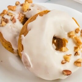 Two Baked Pumpkin Donuts on a plate