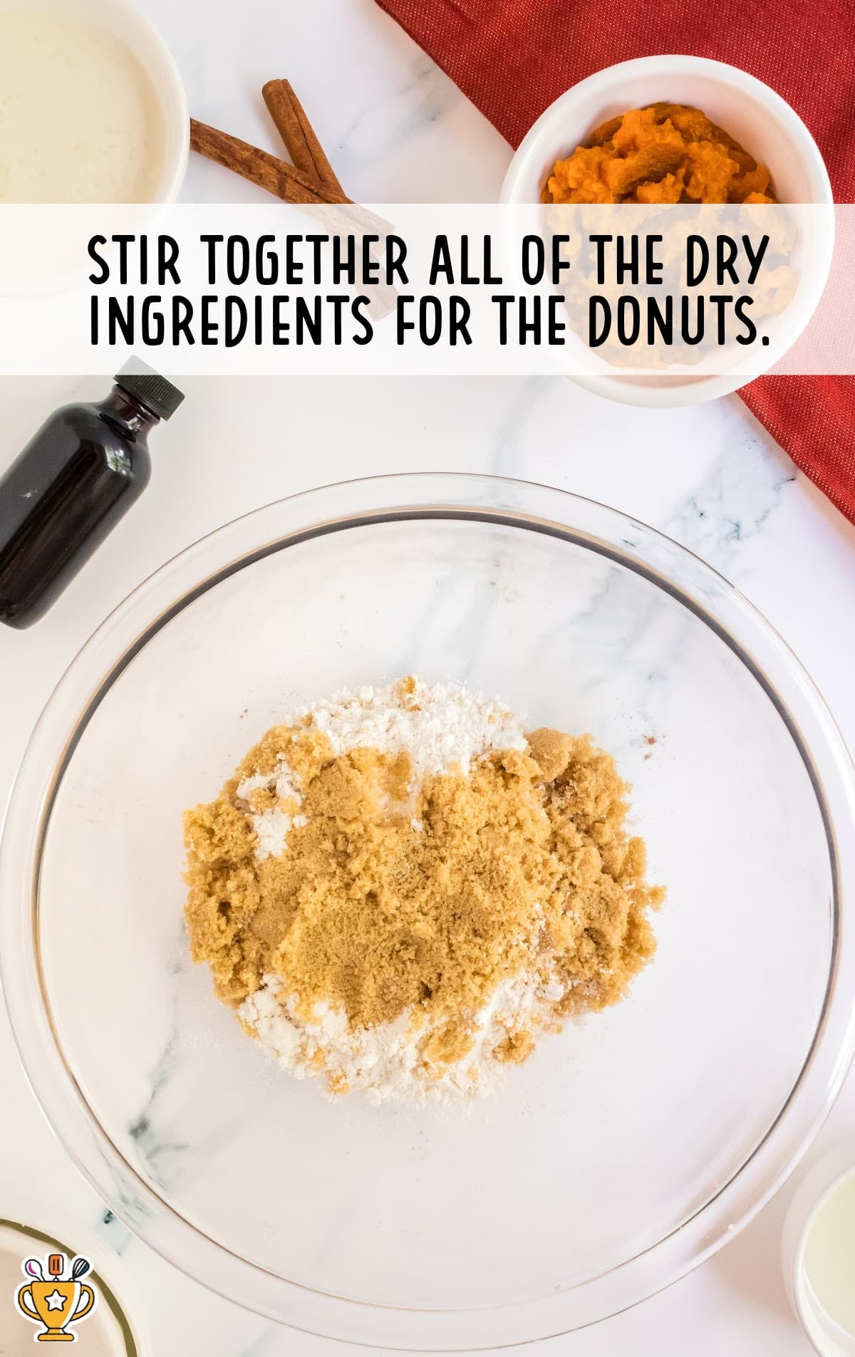 Baked Pumpkin Donuts ingredients in a bowl