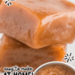 close-up of homemade caramels stacked with wrapped candies and a bubbling caramel pot in background