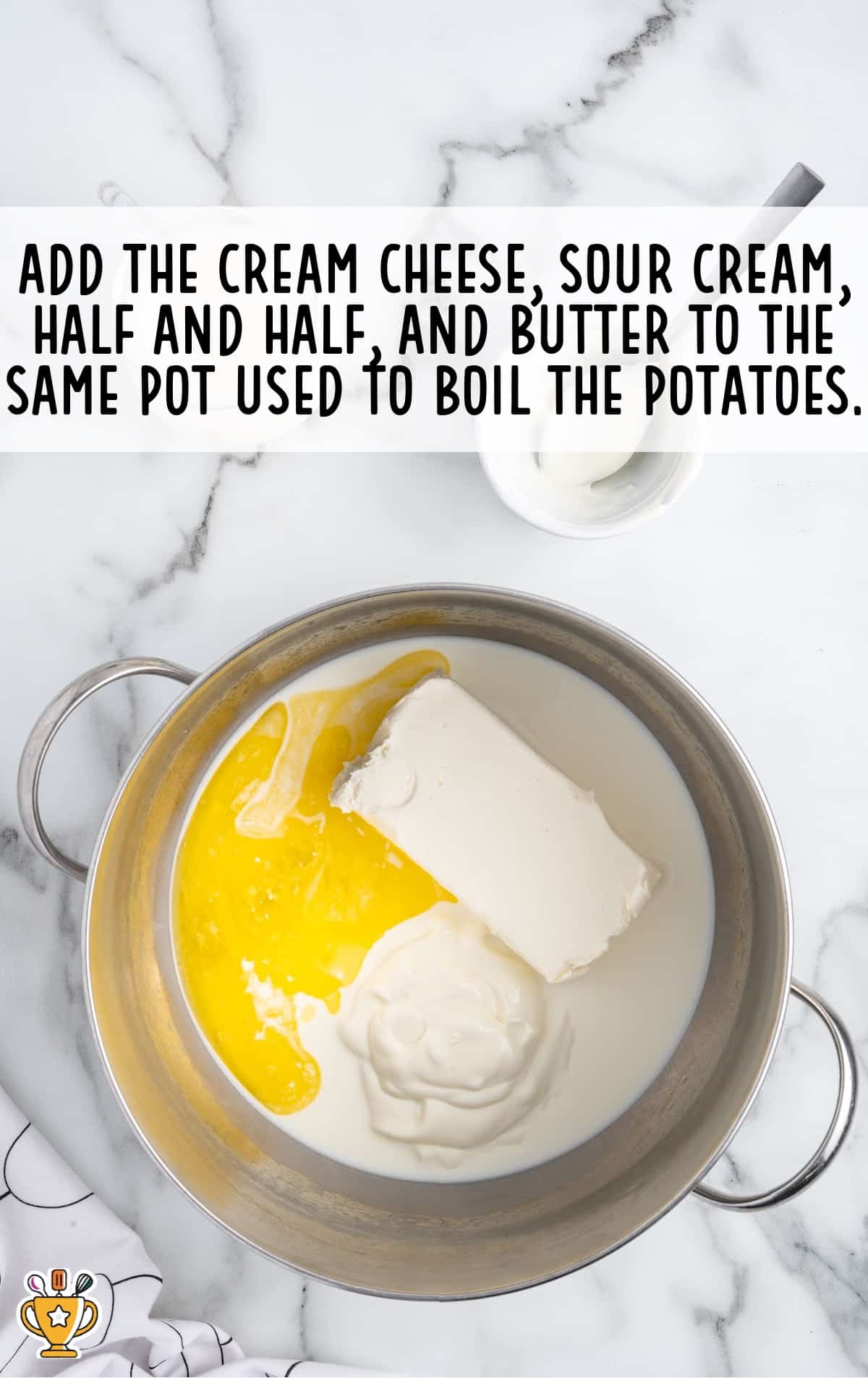 Cream cheese, sour cream, half and half and butter in the pot