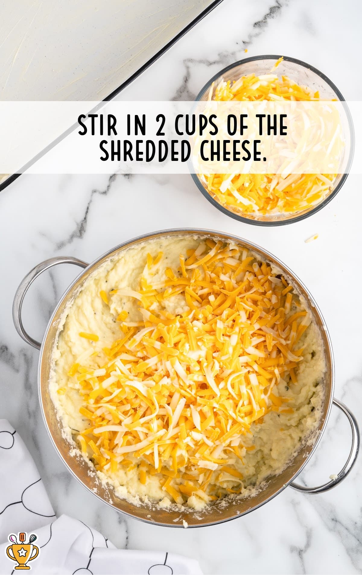 Shredded cheese in a pan and a bowl