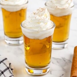 Three glasses of Cinnamon Roll Fireball Shot