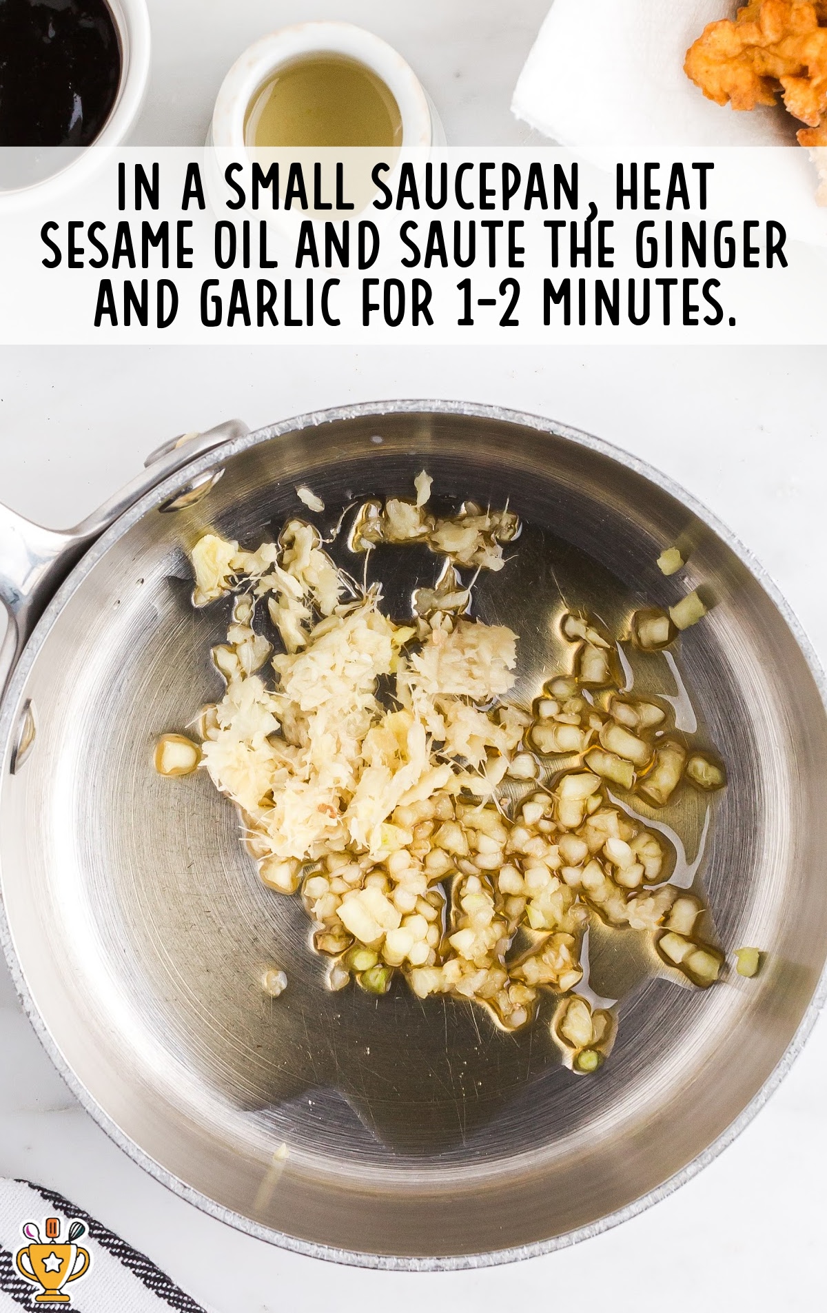 Sesame oil, ginger and garlic in a saucepan