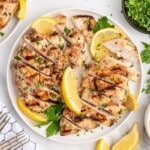 Cooked chicken breast after being marinated in Greek marinade.
