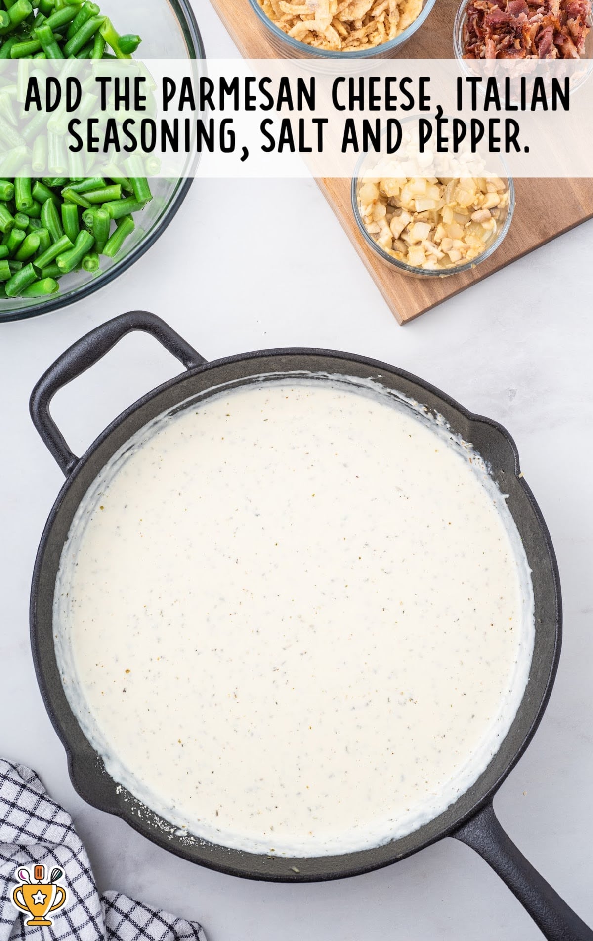 Parmesan cheese, Italian seasoning, salt and pepper added in a bowl.