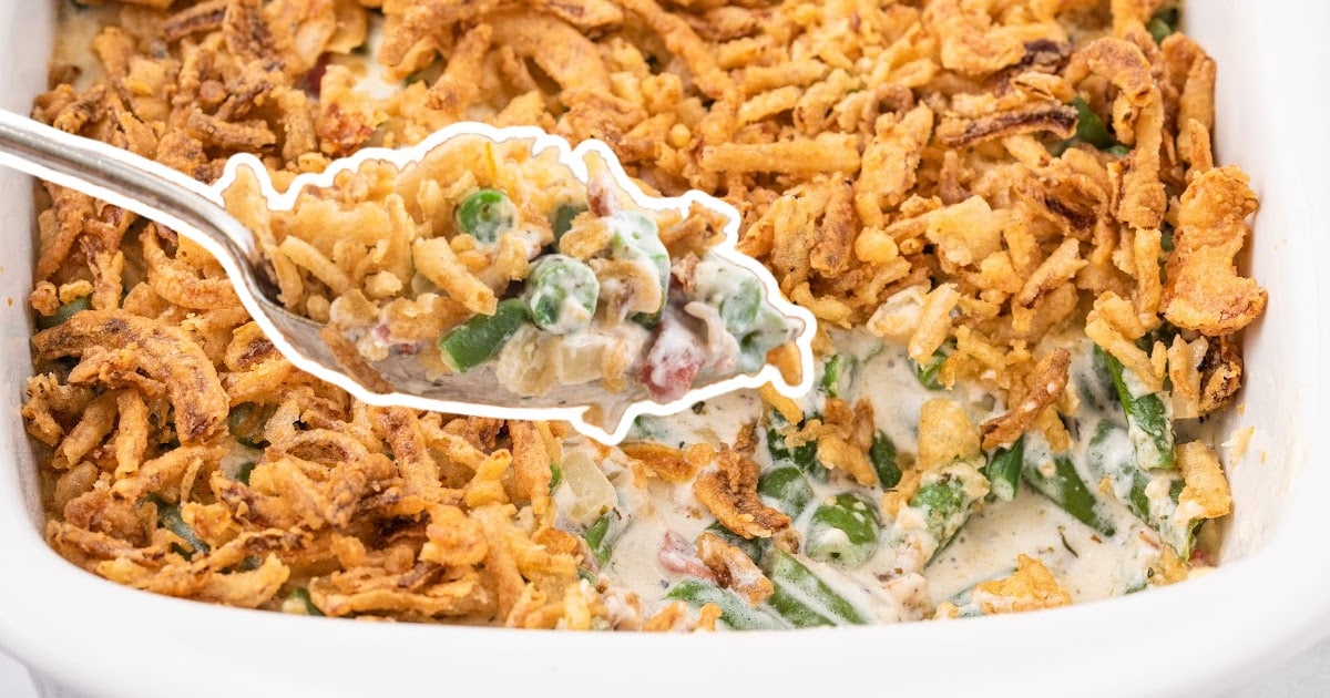 A spoon holding Green Bean Casserole