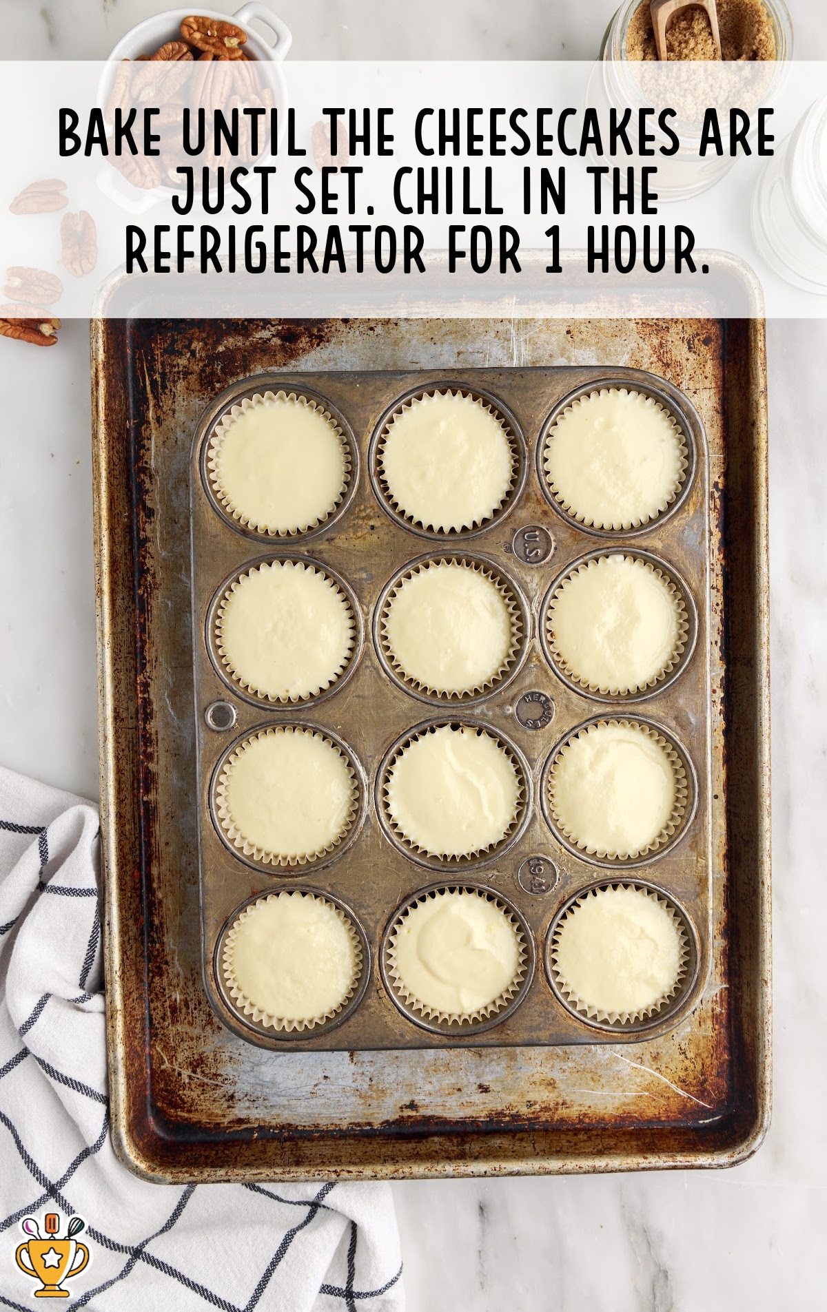 Mini Pecan Cheesecake Filling in a baking tray ready to bake