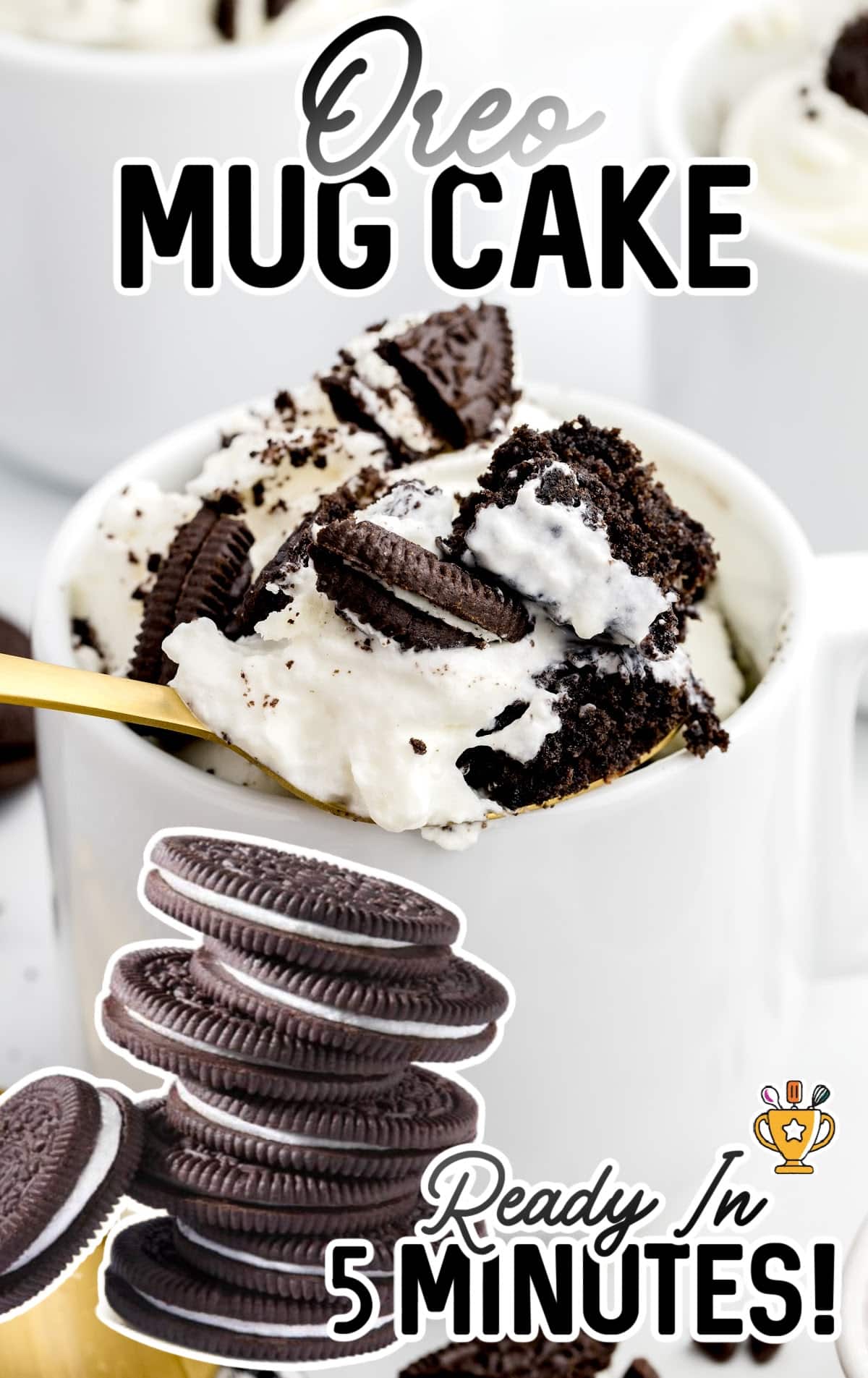 Oreo Mug Cake in a white mug with oreo biscuits on the side