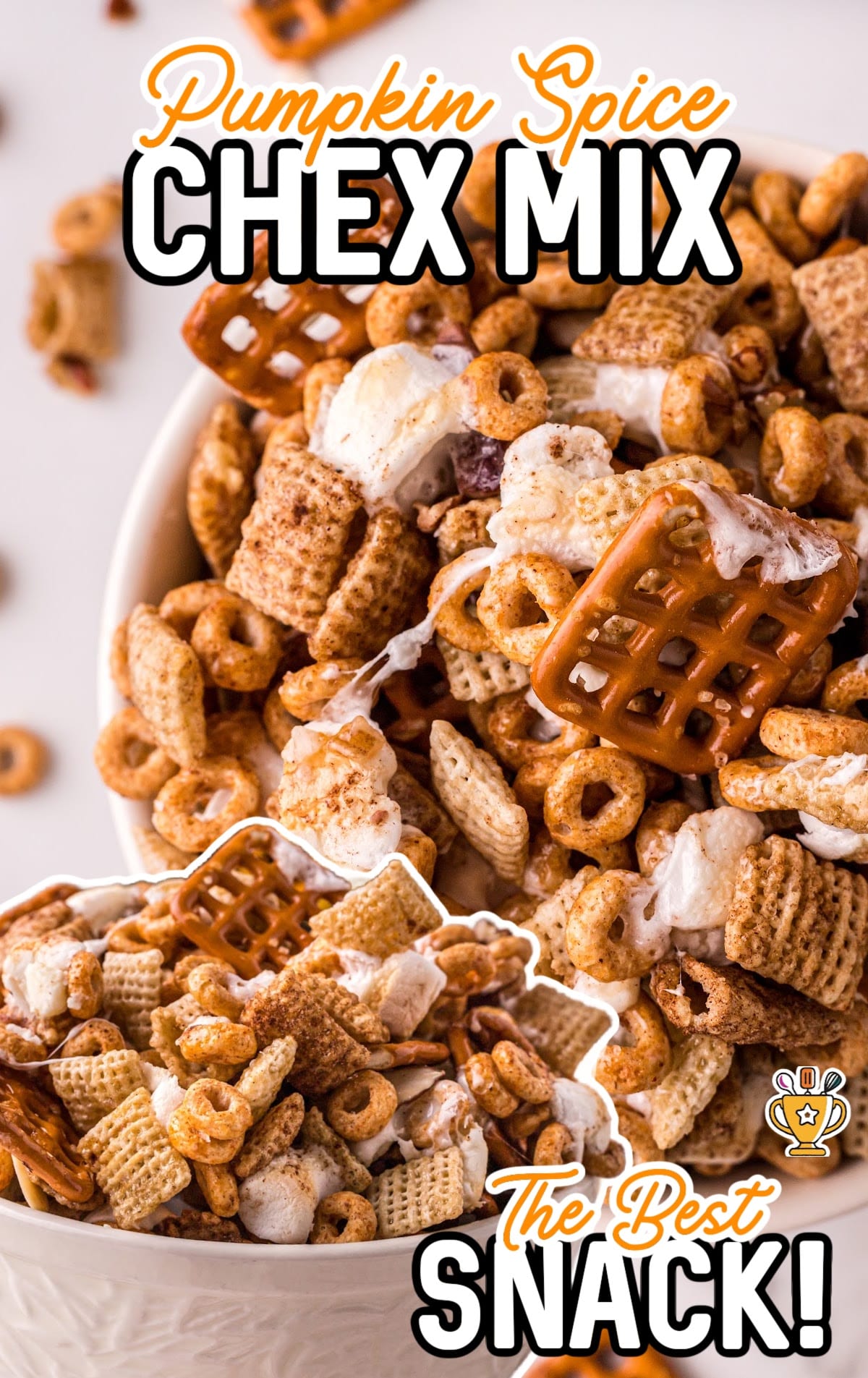 One large bowl and a small bowl full of Pumpkin Spice Chex Mix