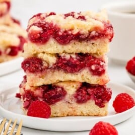 Three squares on a white dessert plate.