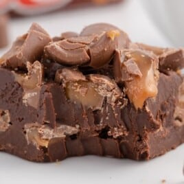 A piece of Rolo Fudge on a white plate