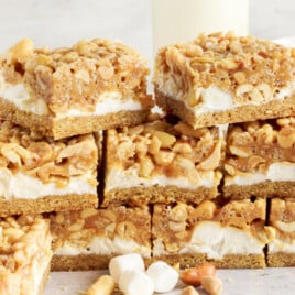 a lot of salted nut roll bars on white parchment