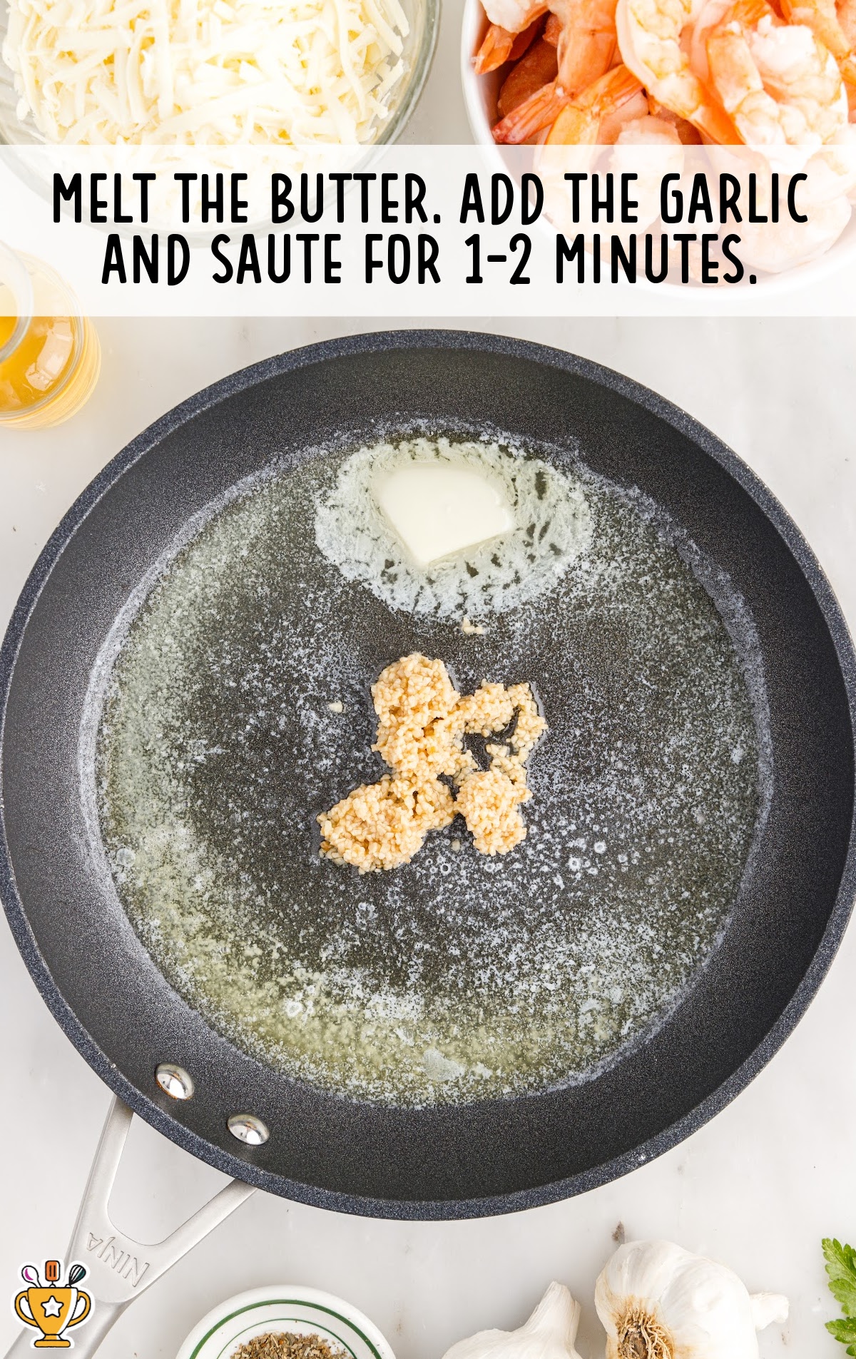 Butter melted in a frying pan with garlic and saute