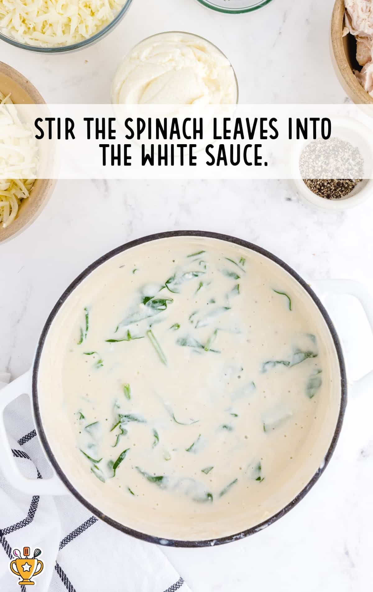 Spinach leaves in a white sauce