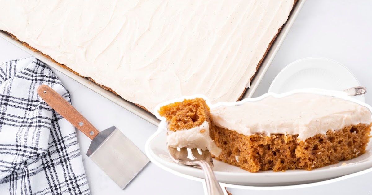 A piece of Pumpkin Sheet Cake on a plate with a fork