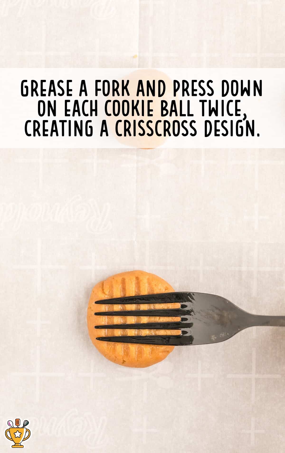 A fork pressing a 3 Ingredient Peanut Butter Cookie creating a crisscross design