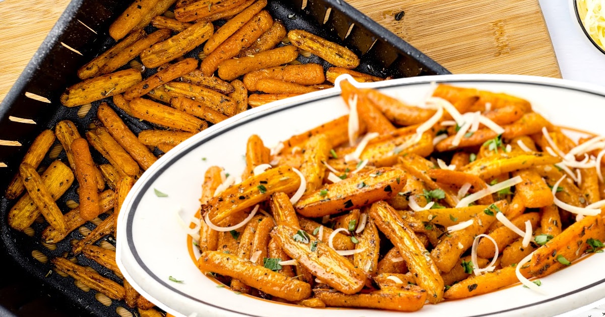 Air Fryer Carrots on a plate with a bunch of Air Fryer Carrots at the back in a cooling pan