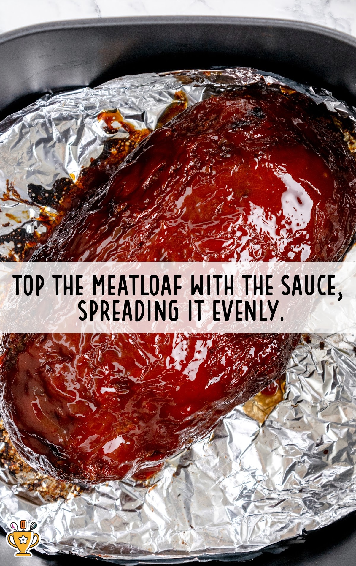the meatloaf spread with the sauce