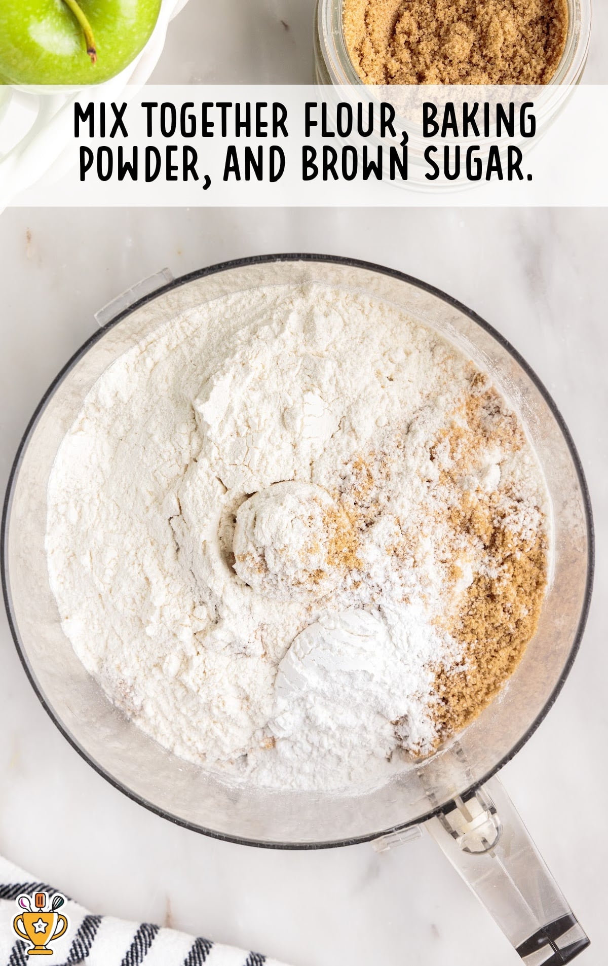 flour, baking powder and brown sugar mixed in a clear bowl
