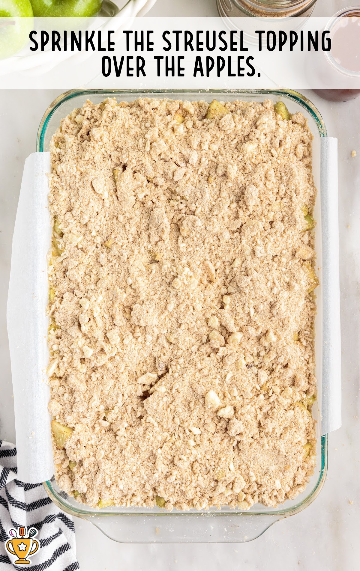 streusel topping sprinkled over apples