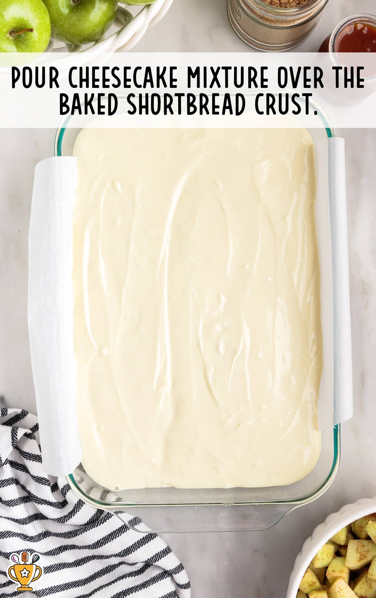 cheesecake mixture poured over baked shortbread crust