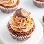 A Butterfinger Cupcake on a plate