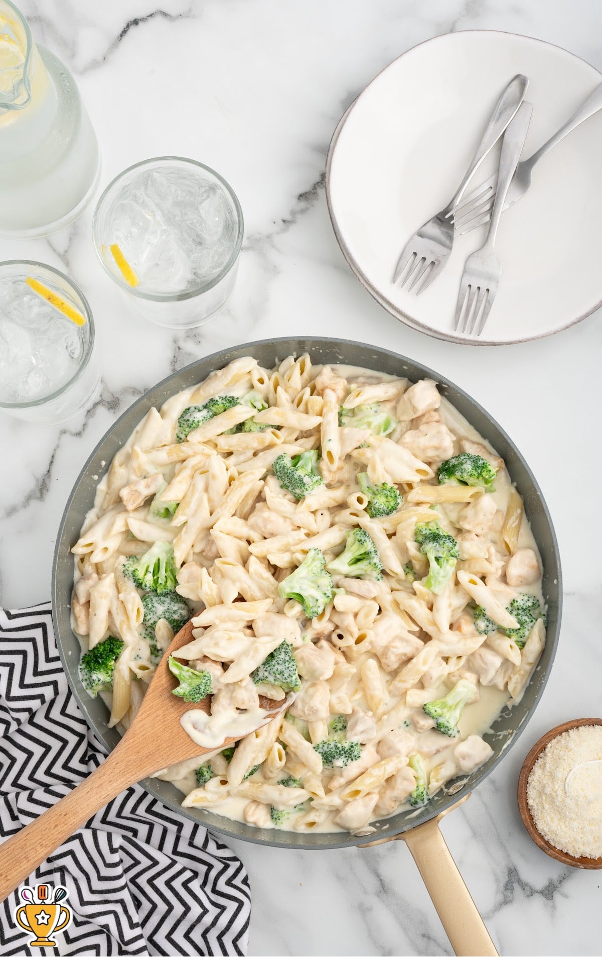 Alfredo pasta cooked in a skillet.