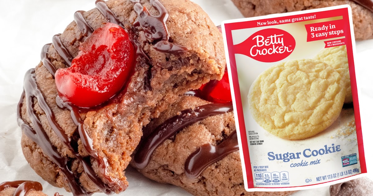 A close up photo of Chocolate Cherry Cookies, one with a bite on it