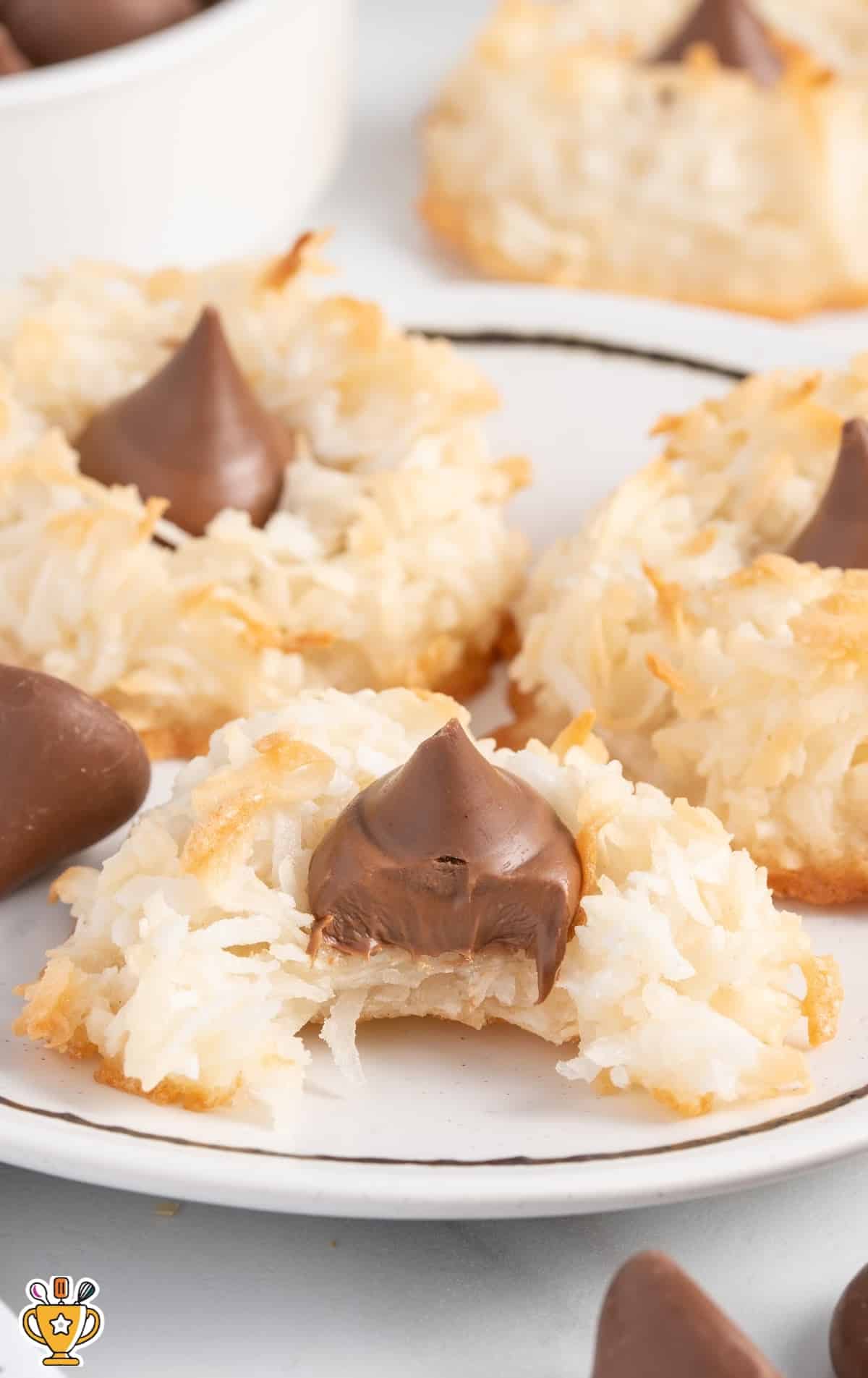 Coconut Blossoms on a plate, one with a bite on it