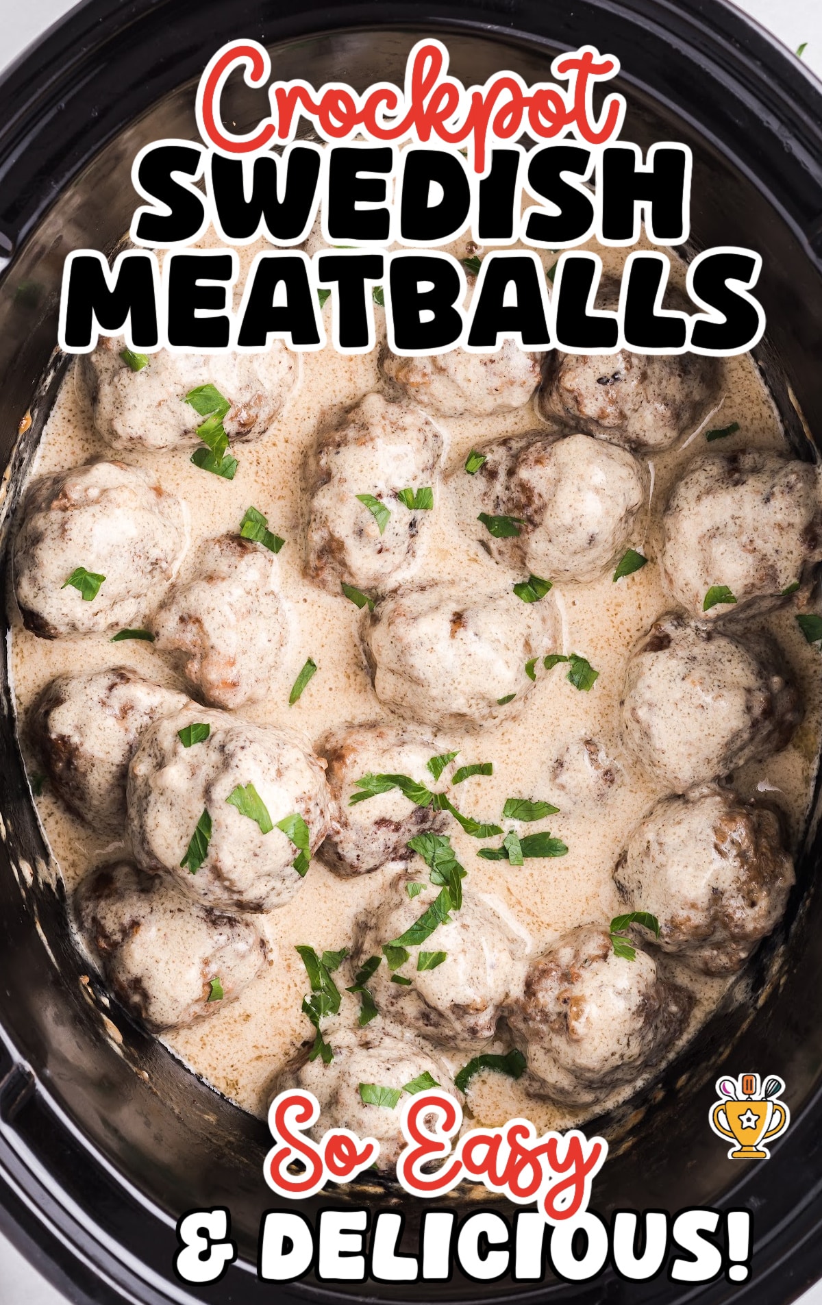 Crockpot filled with Swedish meatballs in a creamy brown gravy, garnished with fresh parsley, showing tender slow-cooked meatballs in sauce.