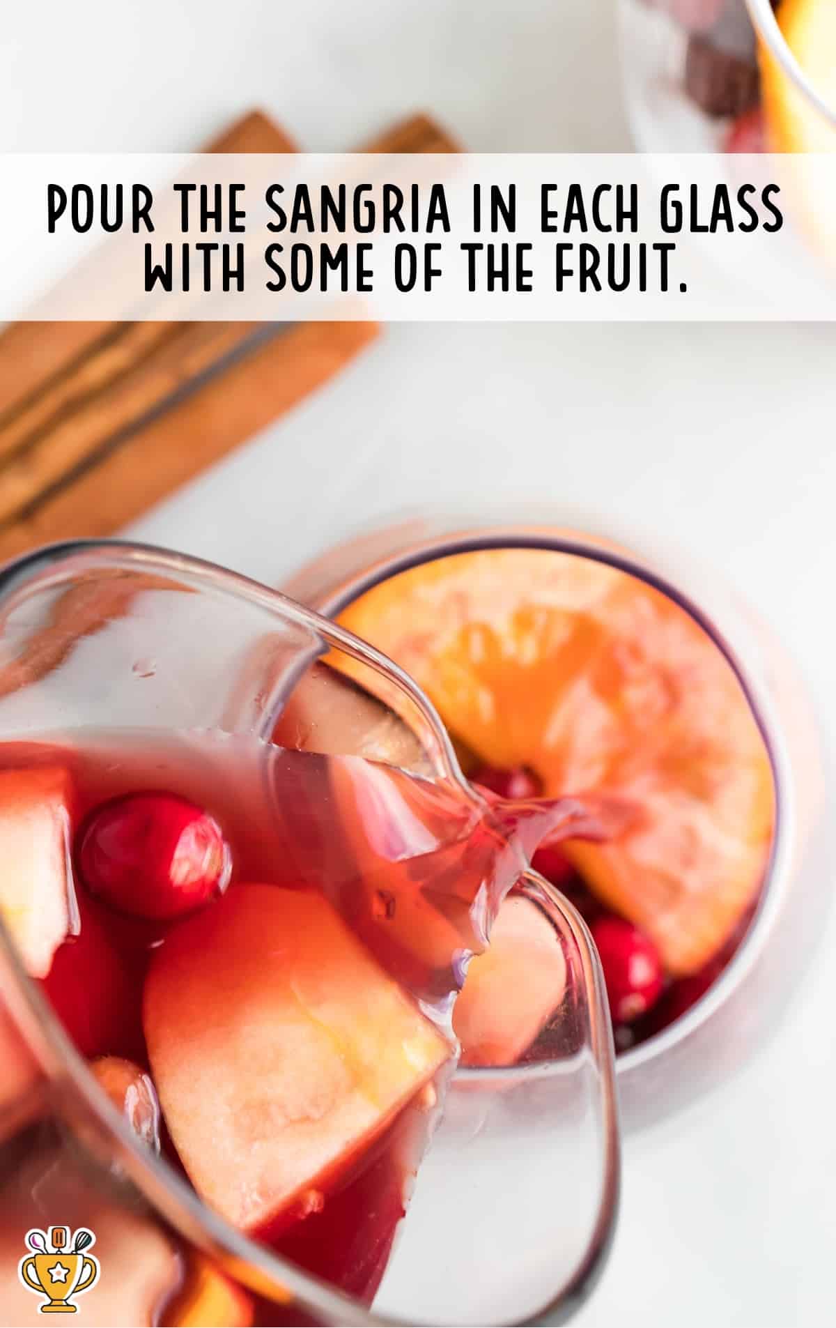 Fall Sangria being poured in a glass