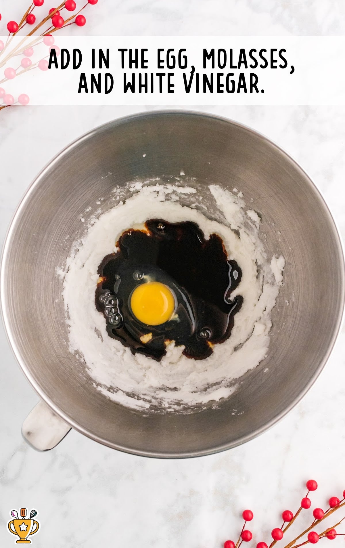 Egg, molasses and white vinegar mixed together in a bowl