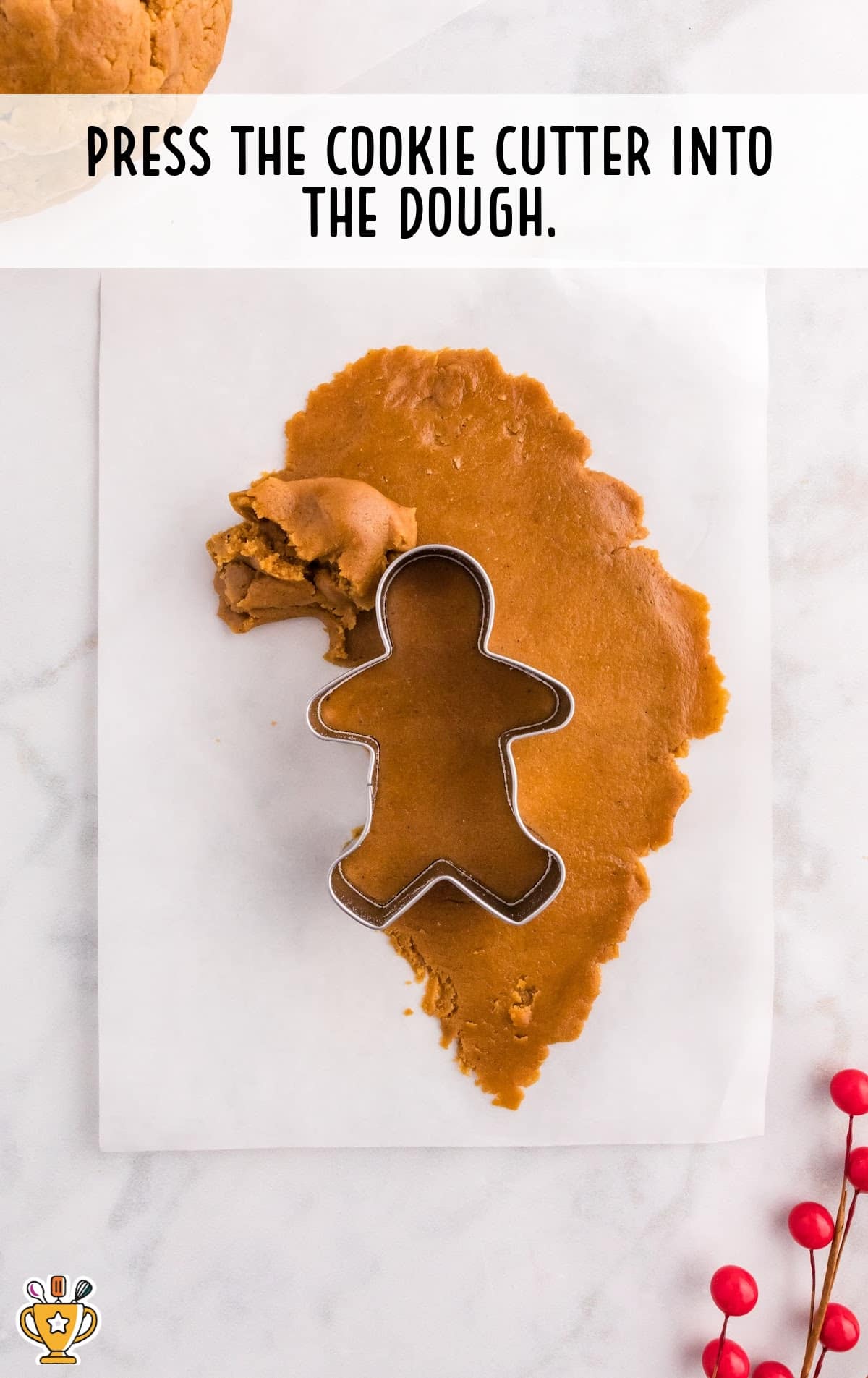 A cookie cutter pressed into the dough