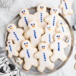 Gingerbread Man Sugar Cookies on a stainless steel plate