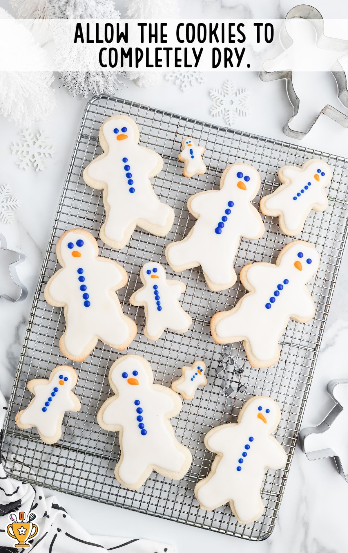 Gingerbread Man Sugar Cookies on a cooling rack for drying