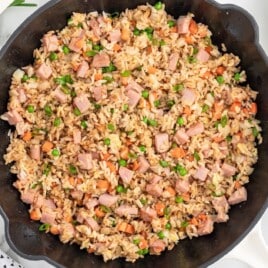 a skillet of ham fried rice