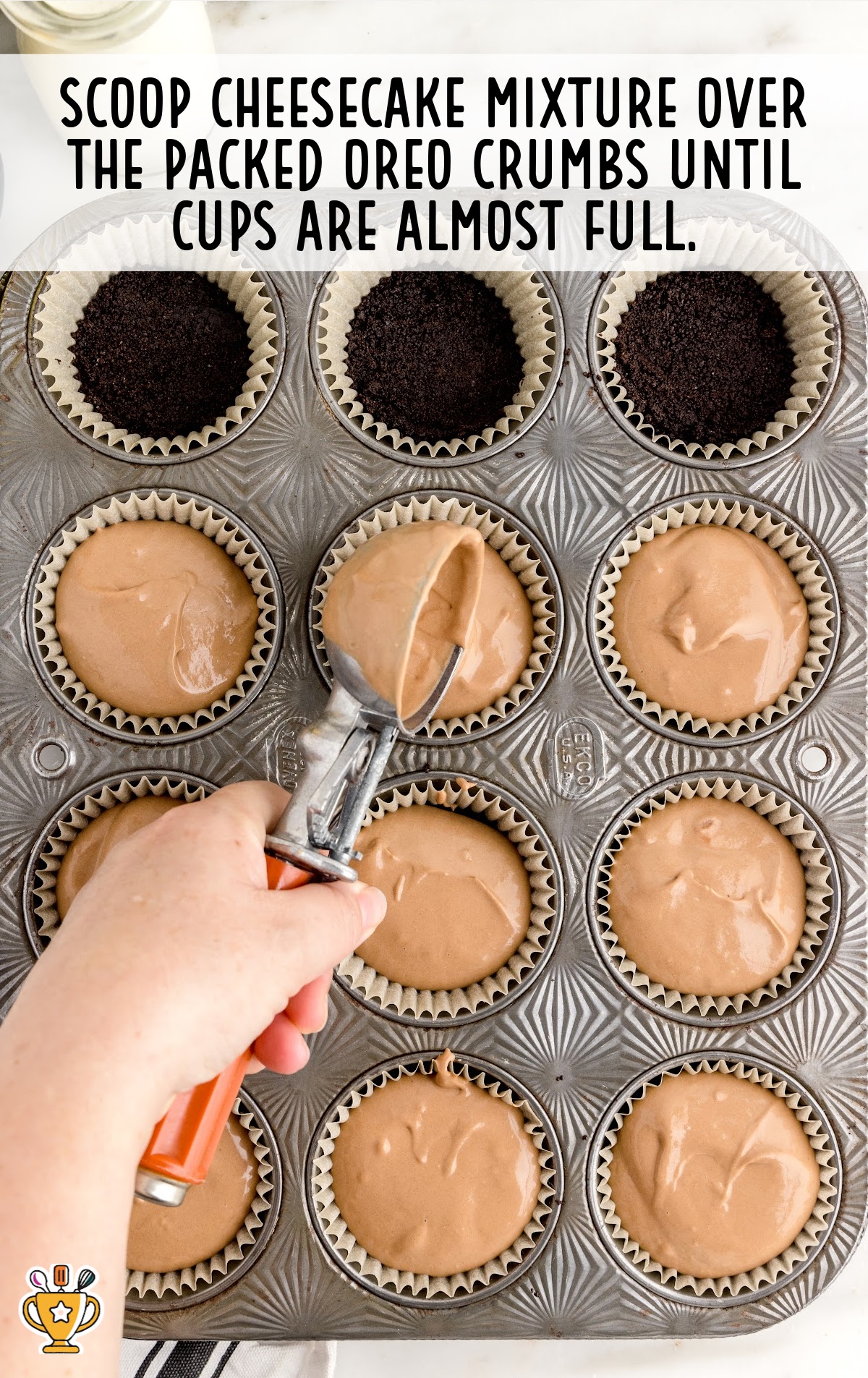 cheesecake mixture added in muffin cups