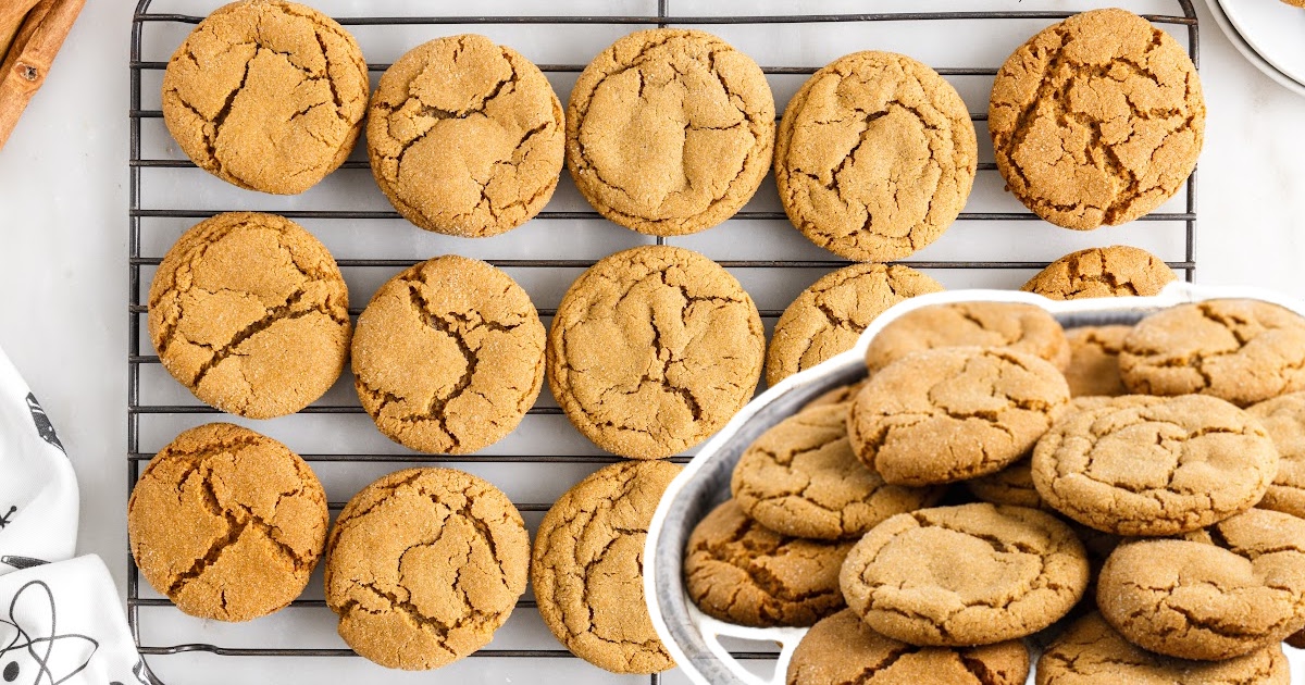 Molasses Cookies on a cooling rack and a plate