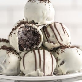 Oreo Truffles stacked on white plates