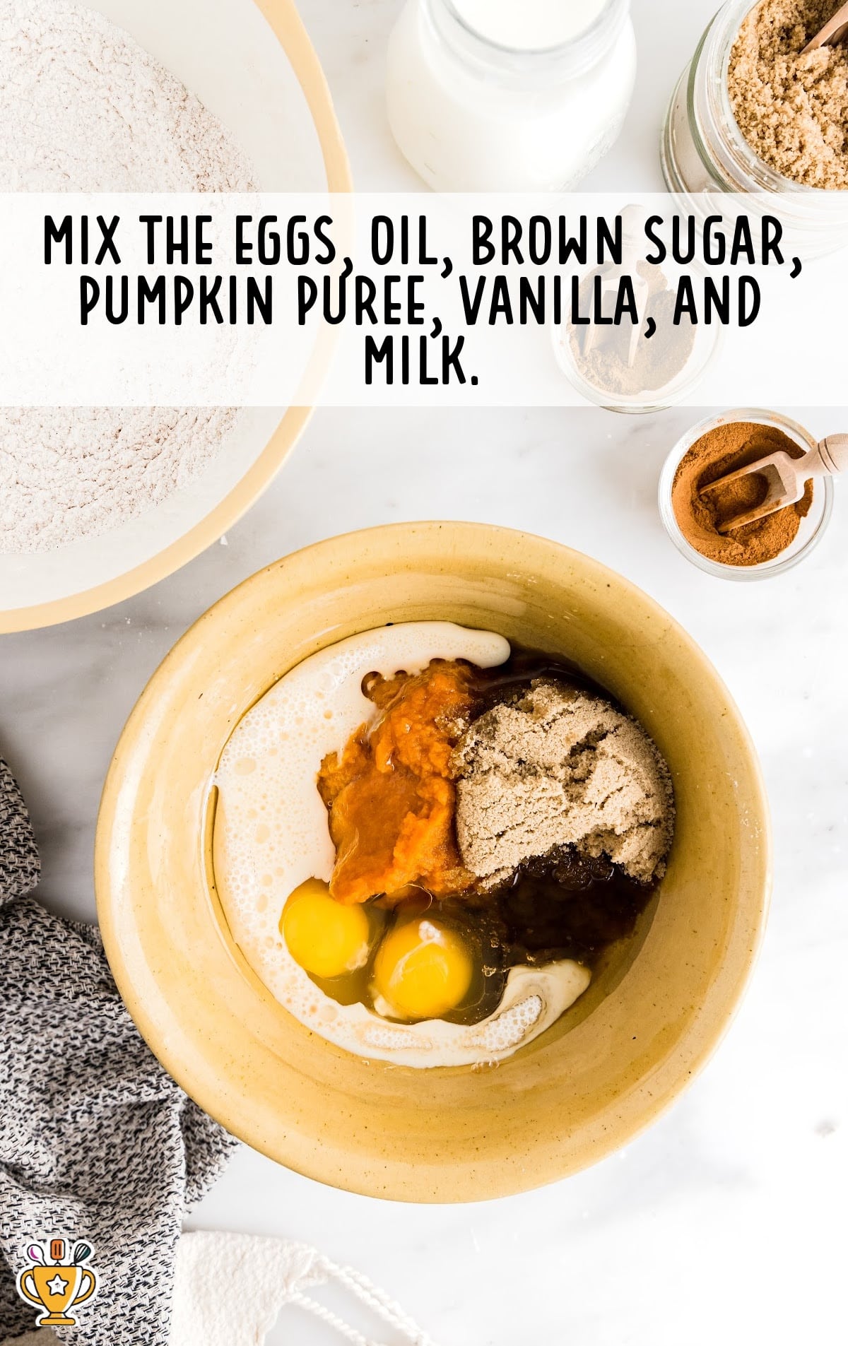 Eggs, oil , pumpkin puree, brown sugar, vanilla and milk in a bowl