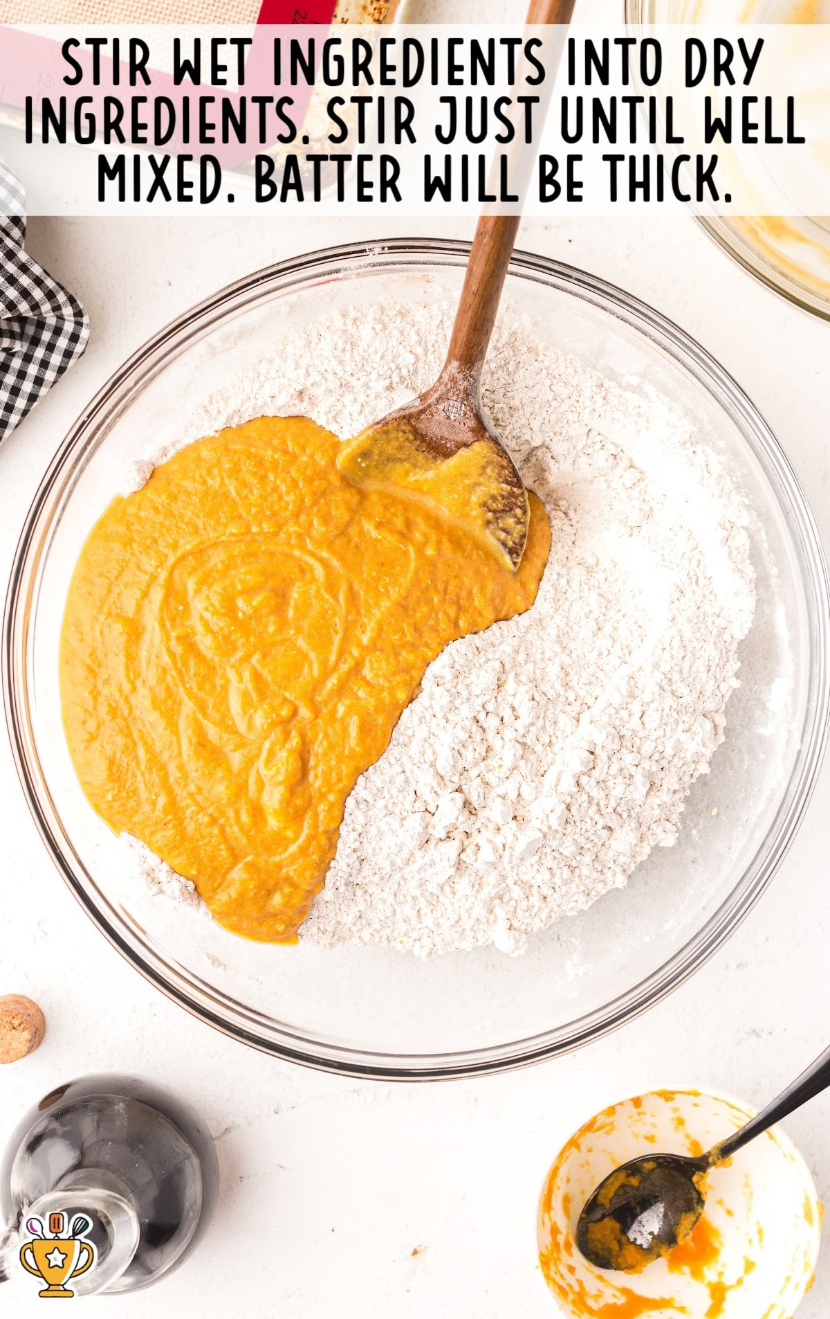 Pumpkin Donut Holes ingredients in a bowl for mixing