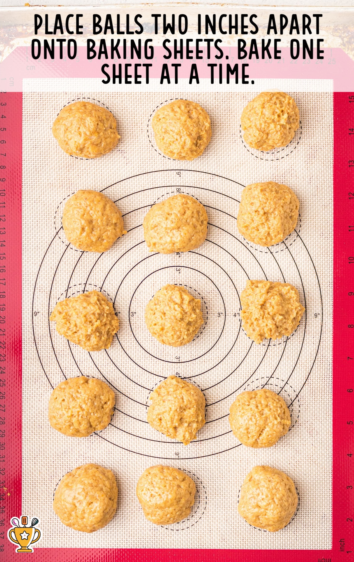 Pumpkin Donut Holes placed on a baking sheet ready for baking