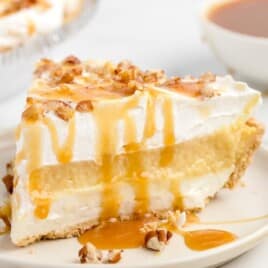 A Salted Caramel Pie on a white serving plate