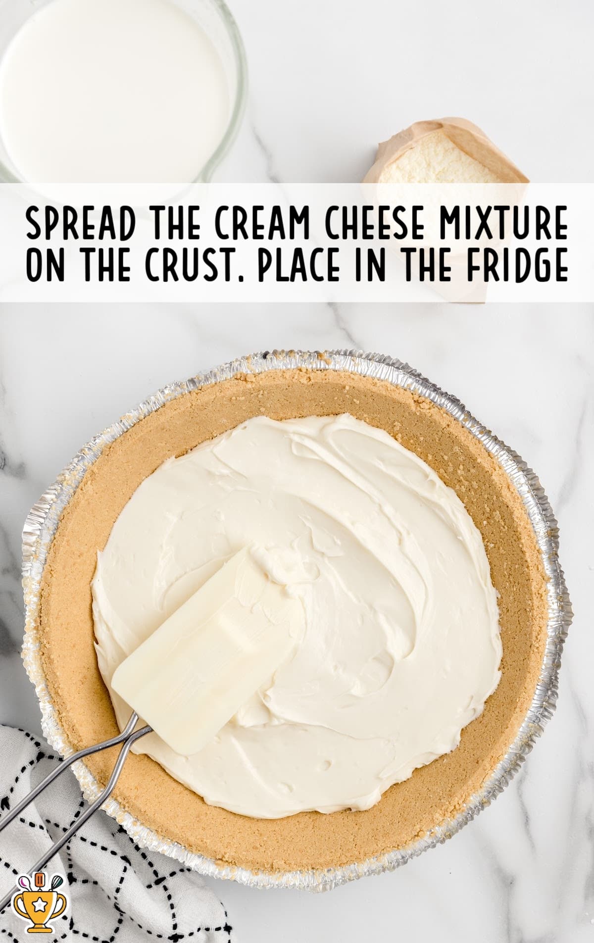 Cream cheese mixture spread on the crust